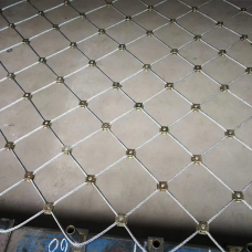 Сетка нержавеющая тросовая со скобочным креплением и ромбической ячейкой Н4 7х7 AISI 316 20х35х1 мм