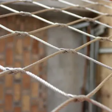 Сетка нержавеющая тросовая с параллельным узловым креплением и ромбической ячейкой Н2 7х7 AISI 304 20х35х1 мм